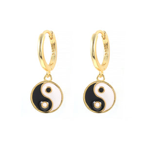 Buy Yin Yang Huggies Earrings | USA | Free Shipping | ShopUfreakb.com | Fast and Free Shipping | These gold plated Yin Yang Daisy Earrings features high-quality materials flower enamel charm with Yin Yang charms. These cute earrings are super comfy for sensitive ears! 