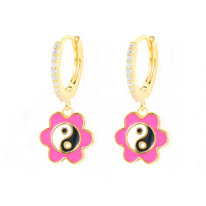 Buy Yin Yang Daisy Earrings | USA | Free Shipping | ShopUfreakb.com | Fast and Free Shipping | These gold plated Yin Yang Daisy Earrings features high-quality materials flower enamel charm with a Yin Yang charms. These cute earrings are super comfy for sensitive ears! 