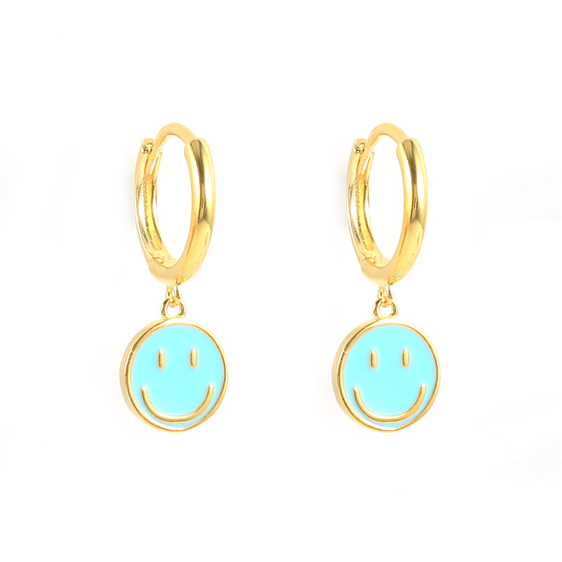 Buy Online Smiley Face Earrings Baby Turquoise | USA | ShopUfreakb.com | Fast and Free Shipping These trendy Smiley Earrings Baby Pink features a smiley face charms design made with high-quality materials to ensure durability. Perfect for wearing as a single piercing, or stacking with other earrings.