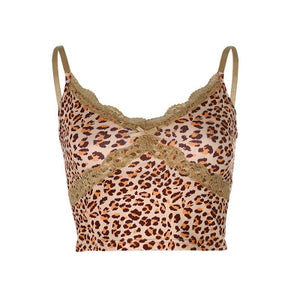 Buy Online Women's Sexy Leopard Print Cami Crop Top | USA | ShopUfreakb.com | Choose this Leopard Cami Crop Top that brings out your fashion sense in front of others. This 90’s spaghetti top features a cropped fit, v neckline with lace trim and a finely ribbed stretch leopard printed fabric. 