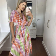 Load image into Gallery viewer, Buy Online Vichy Multicolor Midi Dress | Women&#39;s Clothing | USA | ShopUfreakb.com | Fast and Free Shipping | Upgrade your look with this cute printed midi dress. Featuring an A-line silhouette, v neckline, short sleeves and an asymmetrical fit.
