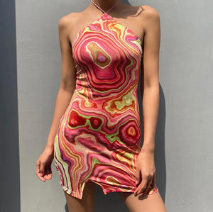 Buy Women's Waves Retro Halter Dress | Retro Fashion | ShopUfreakb.com | Fast and Free Shipping | Style up yourself with this cute Waves Retro Halter Dress. This dress features a bodycon mini fit, open back, halter tie neckline and a cutout detail in the front hem. 