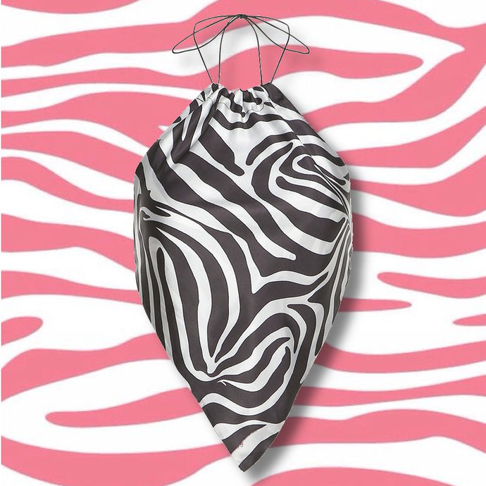 Shop Online Zebra Printed Halter Top | Women's Fashion Clothes | ShopUfreakb.com | Fast and Free Shipping | This zebra printed open-back top ties around the neck and back, making it a great fit for all sizes. You'll love this prefect Y2K styke summer top! 